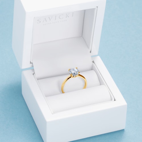 Pierścionek zaręczynowy SAVICKI: złoty, biały szafir